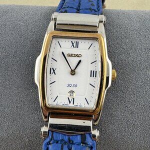 Vintage Seiko SQ 50 Tourneau watch for women features a two-tone Case Blue Strap